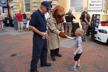 Child meeting Police Mascot